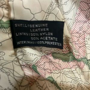 Vintage leather bomber jacket with map inside